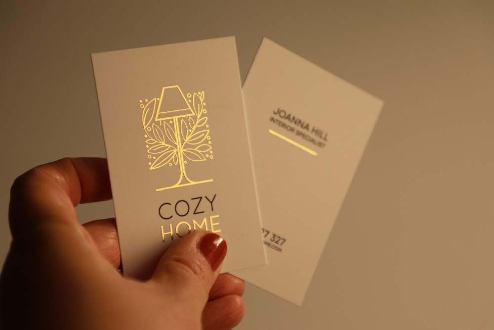 Gold foiling logo on a white business card