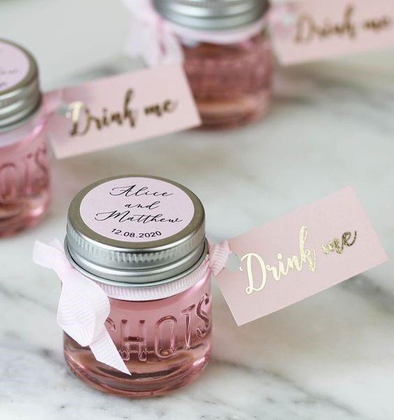drink me keep sakes for a wedding printed on pink swing tags