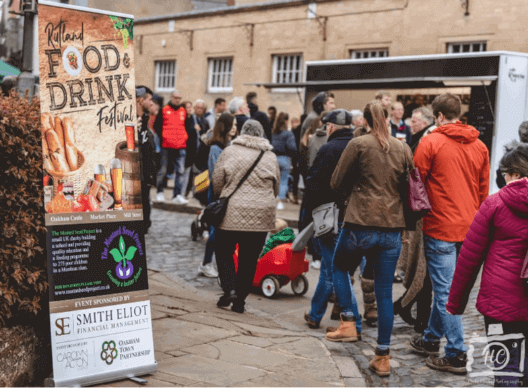 brown outdoor roller banner design for a food and drink festive